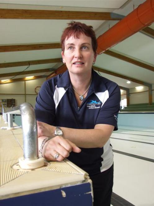 Molyneux Aquatic Centre team leader Donna Drake shows chipped tiles which will be replaced, along...