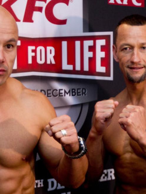 Monty Beetham (left) and Carlos Spencer face off at a press conference at the Pullman Hotel....
