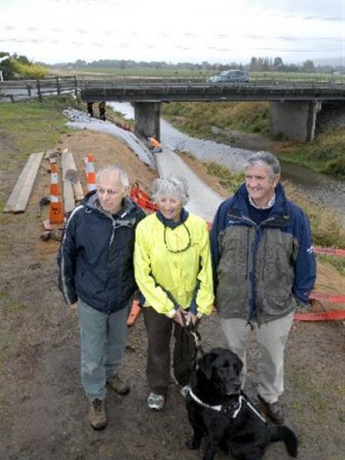 Mosgiel residents Geoff Neilson (left) and Alison Jones (with guide dog Zen) and Otago regional...