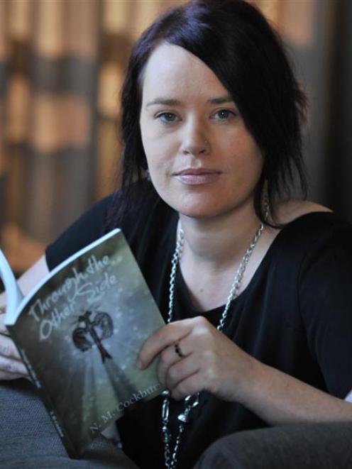Mosgiel woman Nikki Cockburn has written a book about her experience of her partner's suicide....