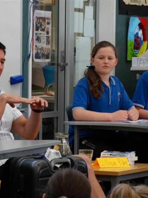 Motivational speaker and author William Pike answers questions from Queenstown Primary School...