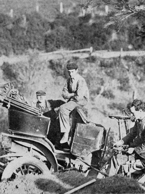 Motor car accident at the Junction Hill, near Dunedin: Mr J. Mills's Buick car hung up in a tree...