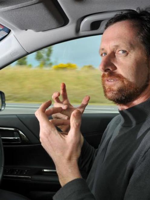 Motoring writer David Thomson explains  how Honda's new ADAS  system works while driving  on the...