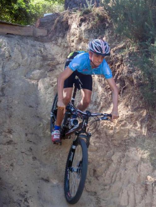 Mount Aspiring College pupil Paul Wright (15) racing in the New Zealand Mountain Bike Cup Series...