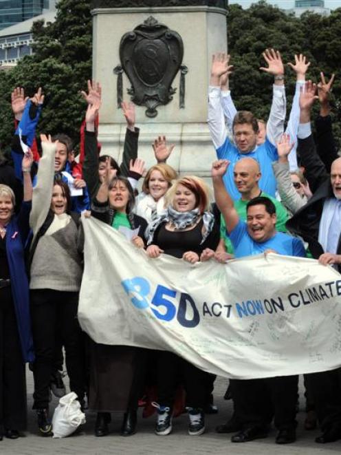 MPs join 350 Aotearoa members in a group performance that highlights people working together for...