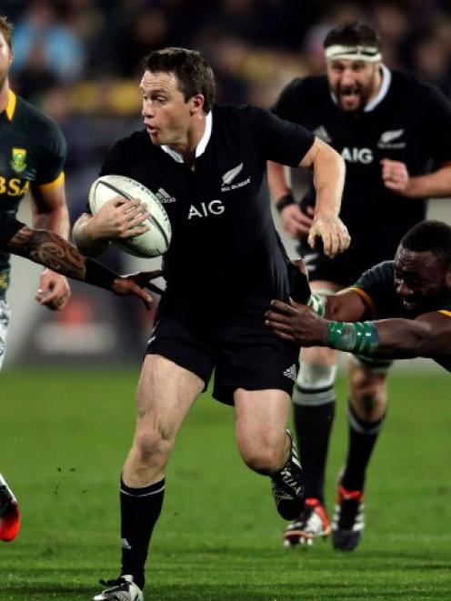 Mr Versatile . . . Ben Smith has played in several positions in the All Black backline. REUTERS...