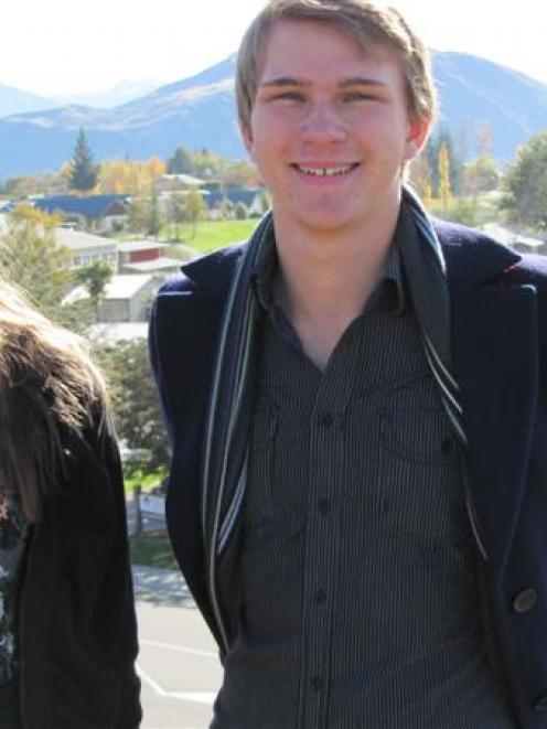 Mt Aspiring College pupils Suzannah Schwarz and Alex Black smile in front of their school...