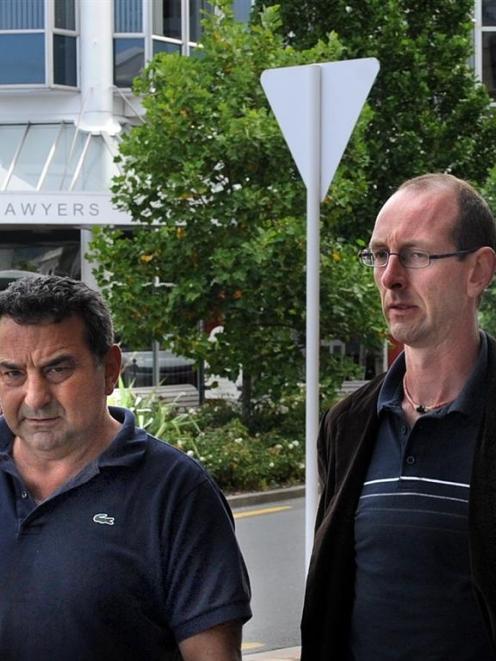 Murder accused David Bain [right] with supporter Joe Karam in the Exchange, Dunedin, yesterday....