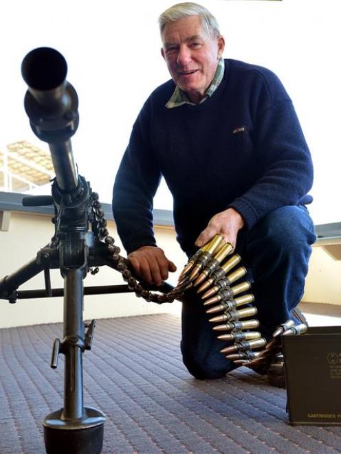 Murray Dempster with  his 50-calibre Browning machine gun at Wingatui racecourse at the weekend....