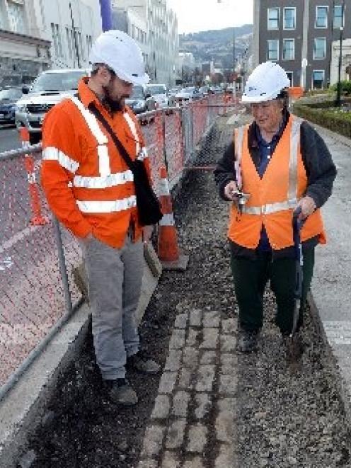 MWH project manager Cassino Doyle stands with  archaeologist Jill Hamel near the Dunedin Railway...