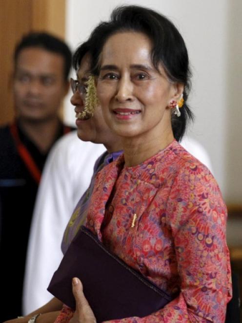 Myanmar's National League for Democracy leader Aung San Suu Kyi arrives to the opening of the new...
