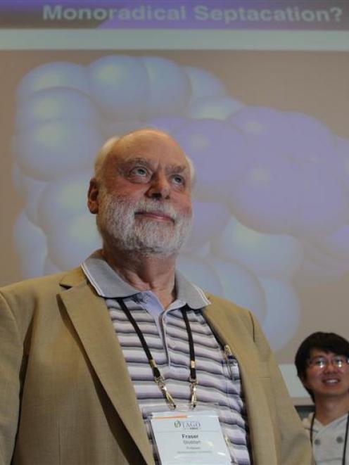 Nanotechnology pioneer Prof Sir Fraser Stoddart, of Scotland, with members of his research team, ...