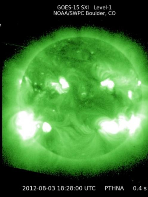 NASA and NOAA's Geostationary Operational Environmental Satellite Solar X-ray Image shows the Sun...
