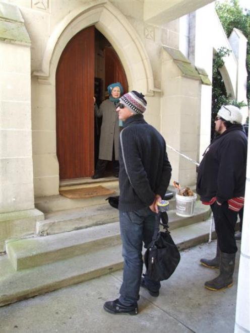 Nathalie Brown stands at the door of the Teschemakers Chapel, near Oamaru, to prevent Dunedin...