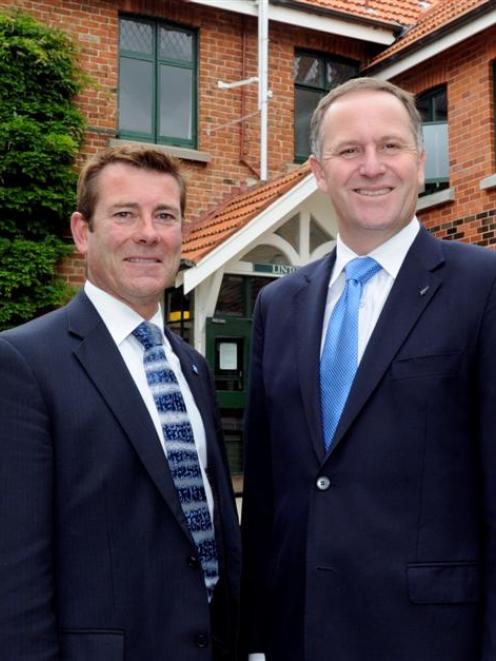 National Party list MP Michael Woodhouse and Prime Minister John Key pause for a photo at...