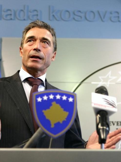 NATO Secretary General Anders Fogh Rasmussen speaks during a news conference after a meeting with...