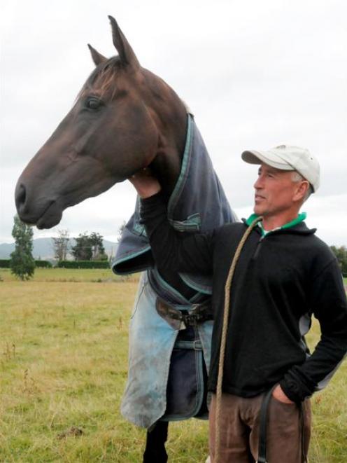 Natuzzi and trainer Paul Richards at  Mosgiel yesterday. Photo by Tayler Strong.