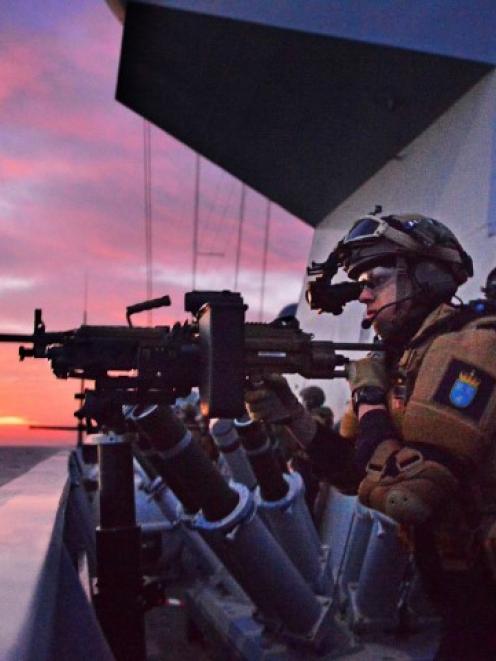 Navy officers on the board the Norwegian frigate HNoMS Helge Ingstad, in Latakia. Norway and...