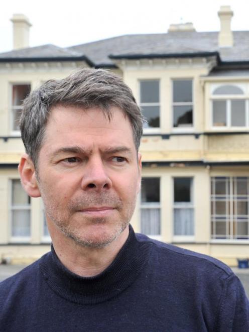 Neighbour Peter Grace outside the historic Dunedin Greenslade Mansion, owned by Otago Girls' High...