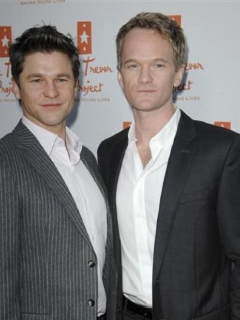 Neil Patrick Harris (right) and partner David Burtka arrive at last year's annual The Trevor...