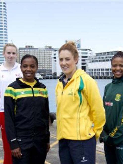 Netball players (L-R) Mwai Kumwenda (Malawi), Laura Langman (NZ), Joanne Harten (England), Nadine...