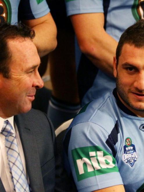 New South Wales coach Ricky Stuart (L) talks to Robbie Farah (R) during State of Origin photo...