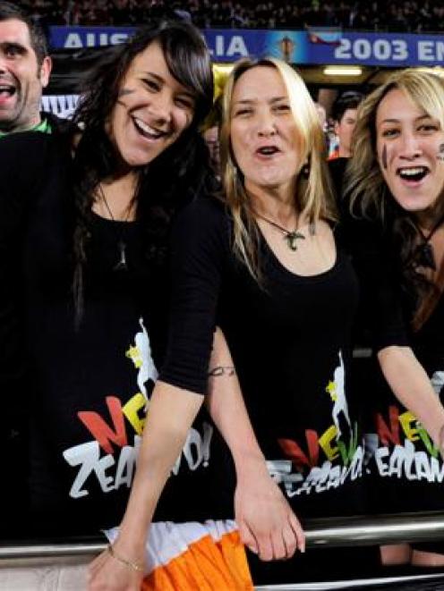 New Zealand All Blacks fans celebrate at Eden Park.     REUTERS/Anthony Phelps