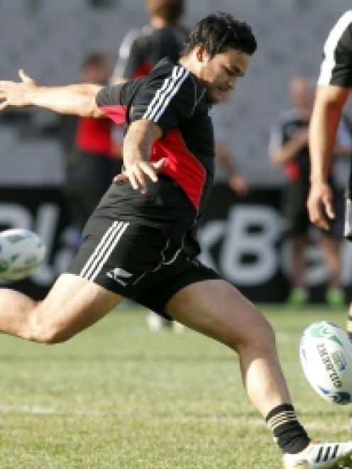 New Zealand All Blacks' Piri Weepu kicks for touch during the All Blacks Captain's run ahead of...