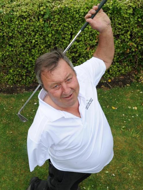 New Zealand amputee golf champion Tony Wilson shows his golfing style yesterday. Photo by Craig...