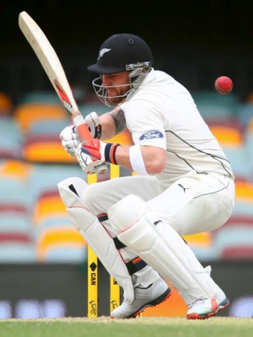 New Zealand captain Brendon McCullum ducks a rising ball from Australia's Mitchell Starc during...