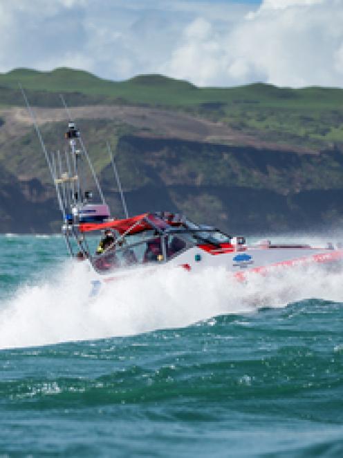 New Zealand Coastguard Waiuku, negotiates the Manukau Harbour Bar. Photo NZ Herald.