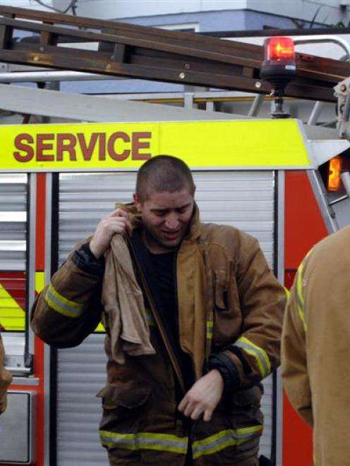 New Zealand Fire Service personnel relax after attending an incident. Photo by Linda Robertson.