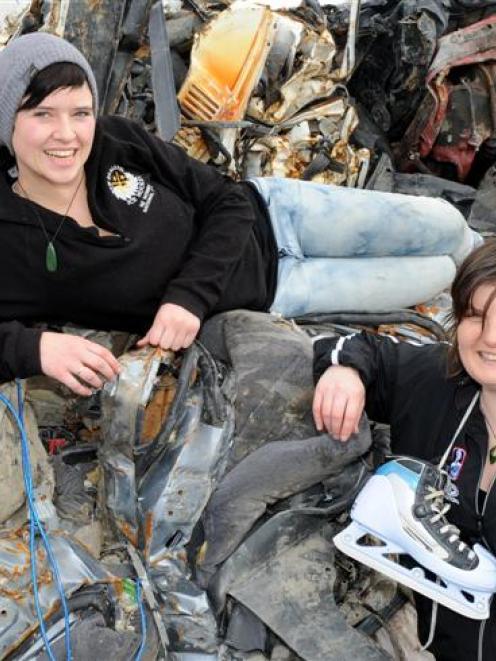 New Zealand ice hockey players Olivia MacDonald (left) and Lyndal Heineman are collecting scrap...