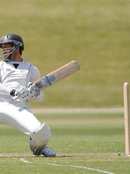 New Zealand Invitation 11 batsman Daniel Flynn avoids a short-pitched delivery during his innings...