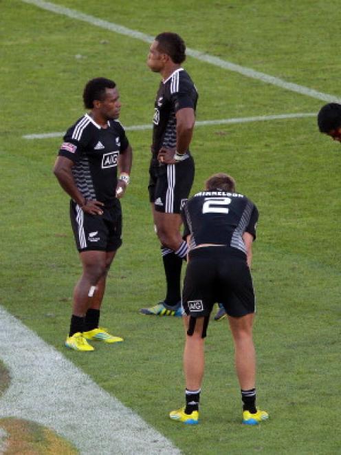 New Zealand players show their disappointment after losing to Kenya.(Photo by Hagen Hopkins/Getty...