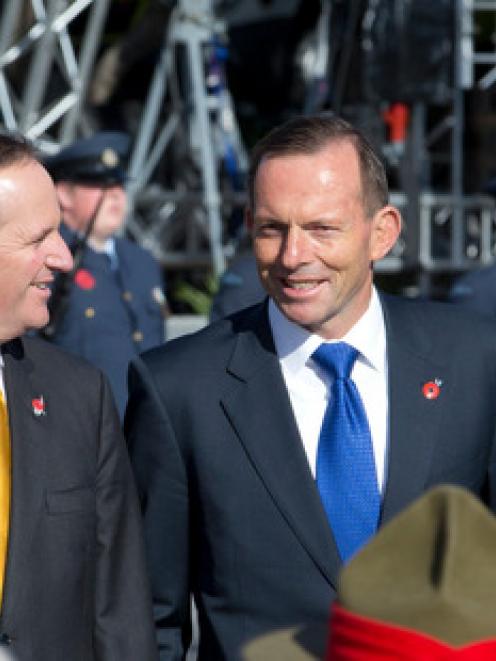 New Zealand Prime Minister John Key and Australian Prime Minister Tony Abbott arrive for the...