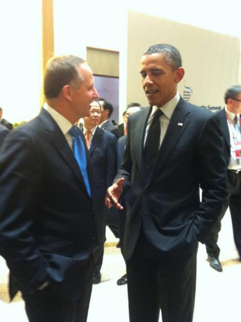 New Zealand Prime Minister John Key and US President Barack Obama chat at the Nuclear Security...