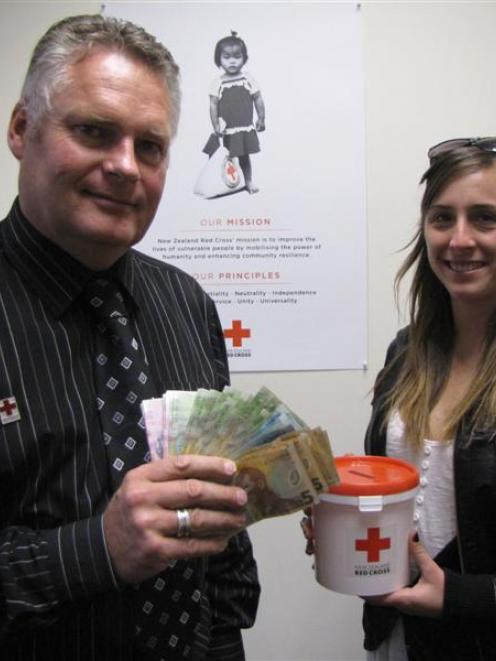 New Zealand Red Cross service centre co-ordinator Richard Garden, of Queenstown, and fundraiser...
