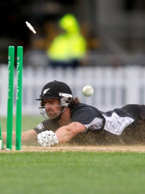 New Zealand's Colin de Grandhomme is run out during the final one-day international against South...