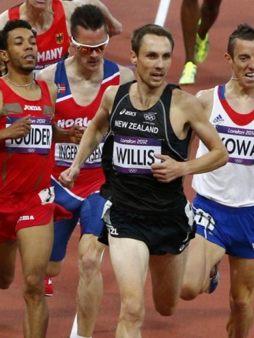 New Zealand's Nick Willis wins the men's 1500m round 1 heat ahead of of Morocco's Abdalaati...