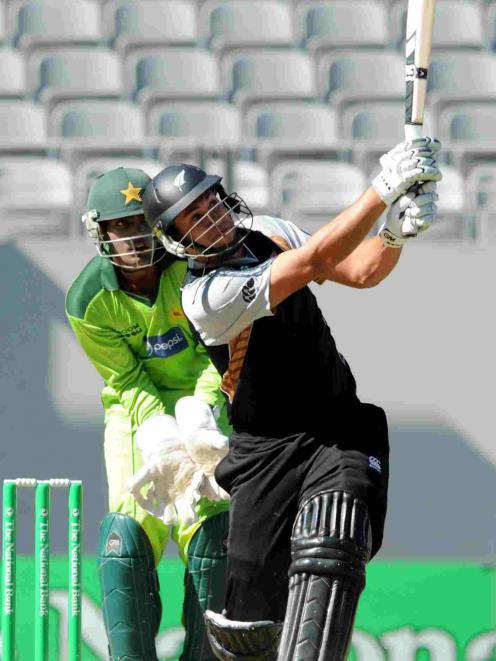 New Zealand's Ross Taylor hits a six into the grandstand against Pakistan in the International...