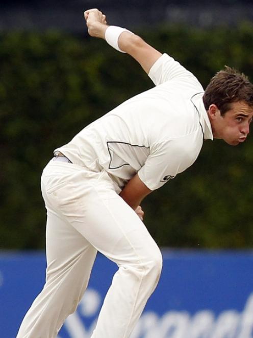 New Zealand's Tim Southee bowls during the third day of the second and final test cricket match...