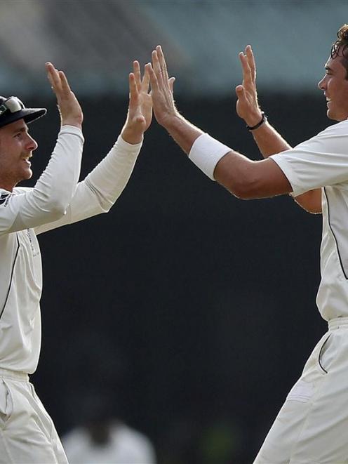 New Zealand's Tim Southee (right) has beenn ruled out of the South African tour. REUTERS/Dinuka...