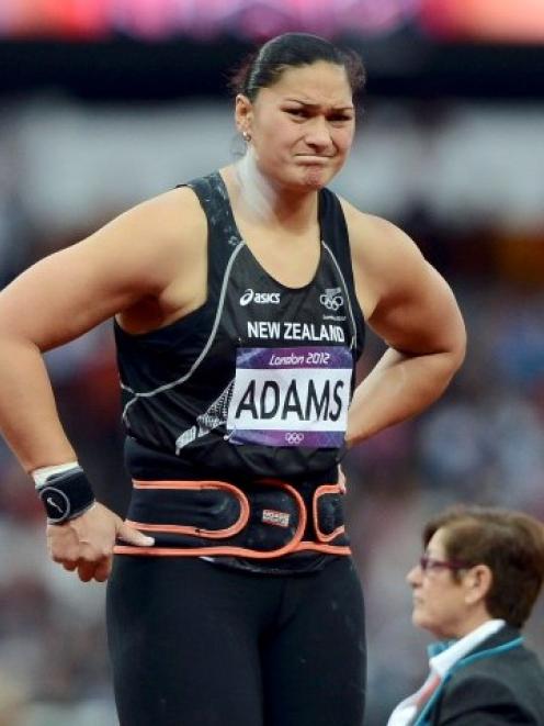 New Zealand's Valerie Adams reacts to winning silver in the women's shot put final at the Olympic...