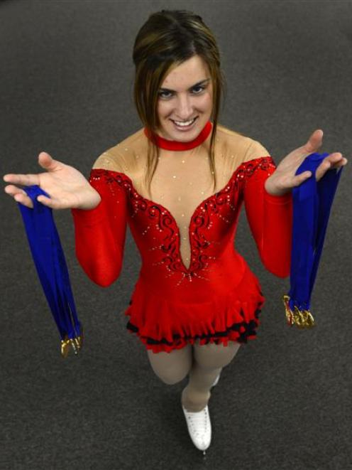 New Zealand women's figure skating champion Morgan Templeton  proudly shows off the spoils of her...