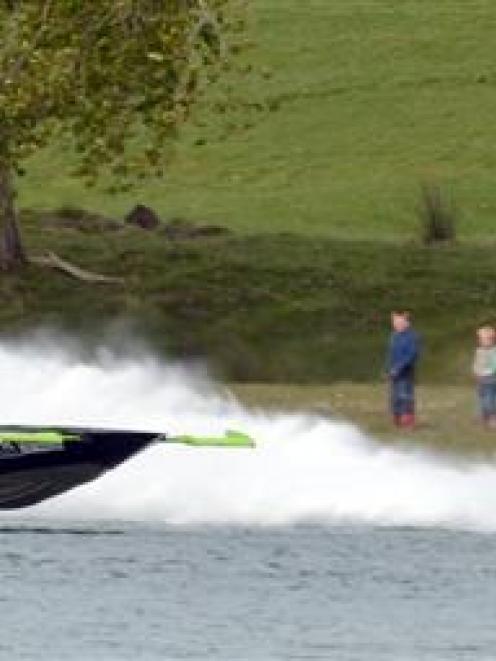 New Zealander John Derry so far leads the 2013 U.I.M World Championship Jet Boat Marathon at the...