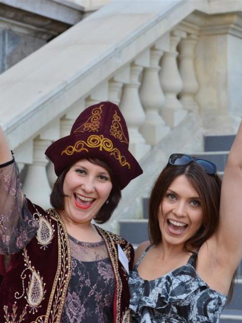 Newly-sworn New Zealand citizen Alevtina Redden (30), left, of Kazakstan, with friend Genia...