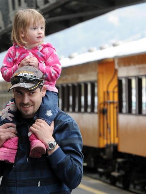 Nick  and Mia Pope, of Rolleston, disembark at Dunedin Railway Station after taking a train trip...