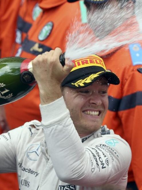 Nico Rosberg celebrates his victory in the Monaco Grand Prix. REUTERS/Stefano Rellandini