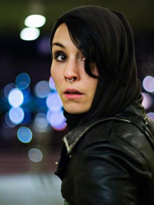 Noomi Rapace as Lisbeth Salander.